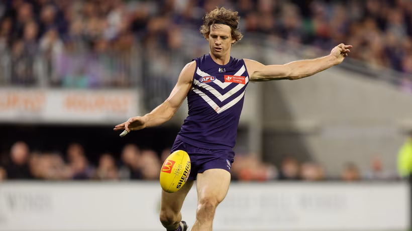 Nat Fyfe’s Role in Fremantle’s Second Half of the Season   The Fremantle Dockers are facing a pressing question: how to utilize their champion onballer, Nat Fyfe, in the second half of the season. Fyfe has been making a strong impact since his return from injury, playing a limited midfield role and rotating from the forward line…